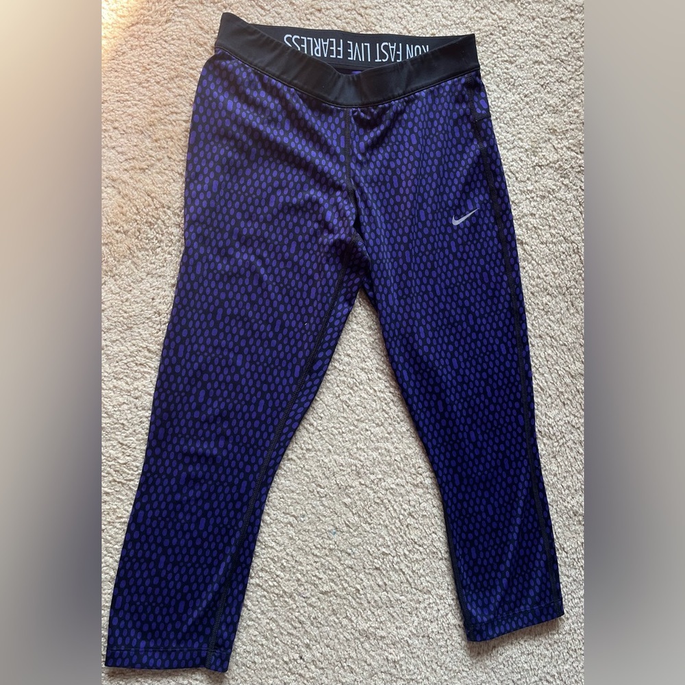 Nike size medium purple/ black dri-fit leggings 7/8th length